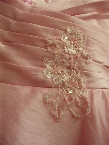 pleated applique and sequin bodice